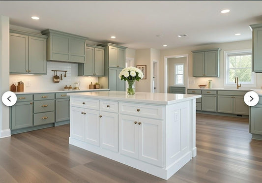 Modern kitchen with white island and green cabinets