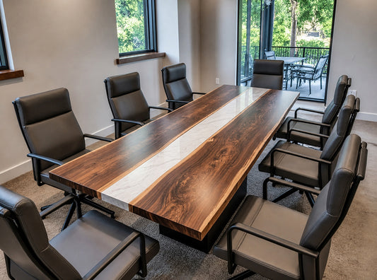 Long wooden conference table with eight chairs in a modern office setting.