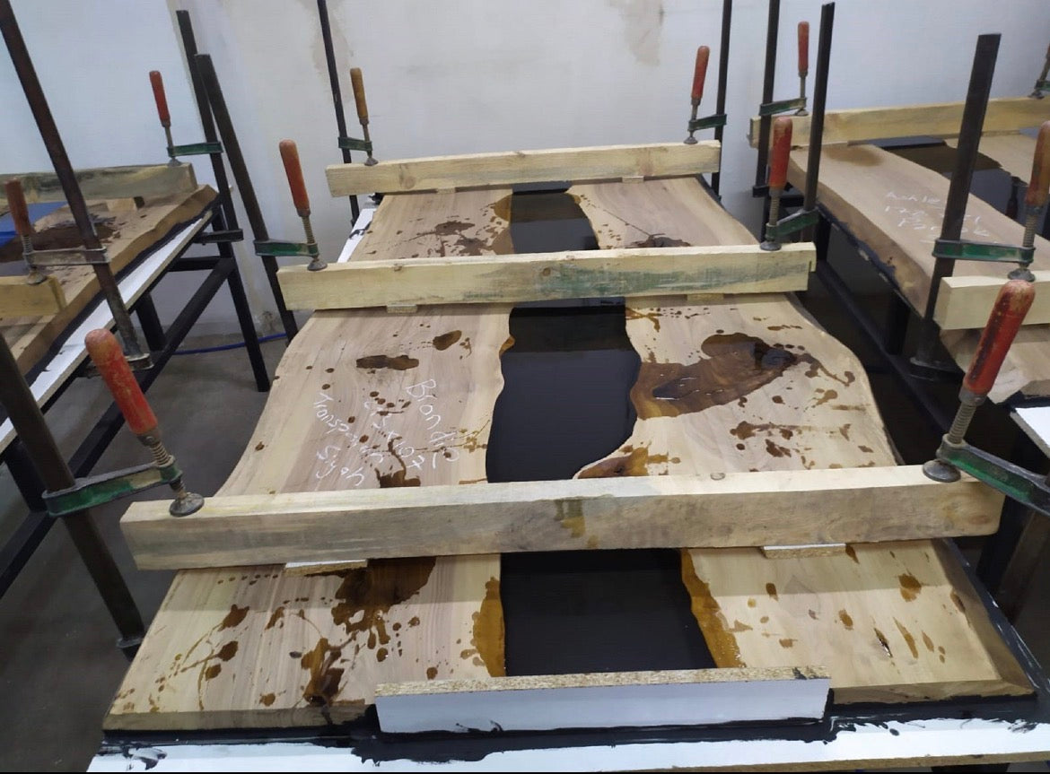 Executive desk under construction in the workshop with clamps