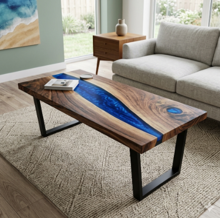 Walnut coffee table with blue epoxy river in a bright living room