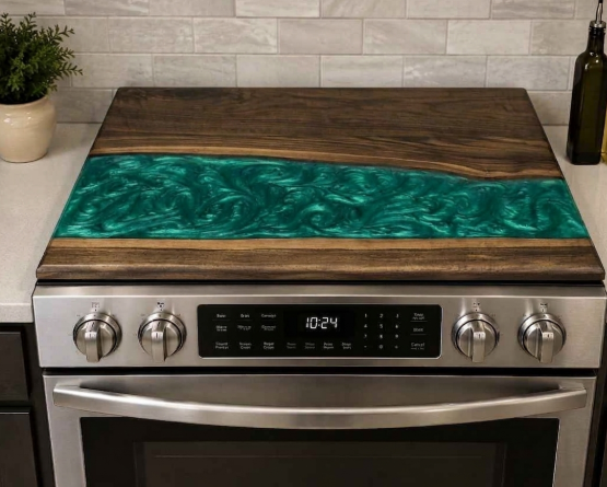 Walnut stove top cover with teal green epoxy river