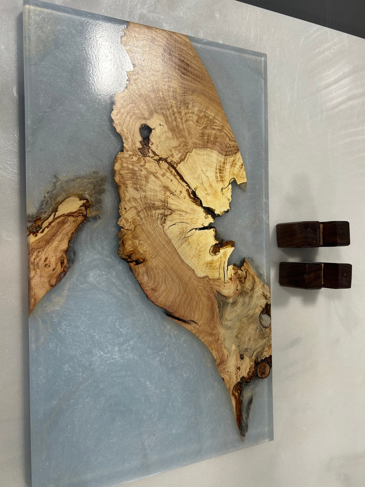 Live edge burl wood and light blue epoxy magnetic knife holder, front view
