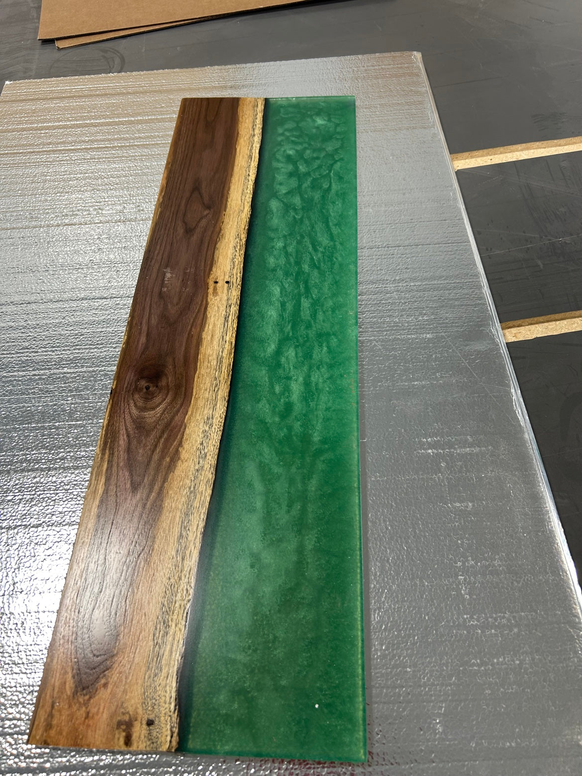 Walnut bath caddy with emerald green epoxy river, top view