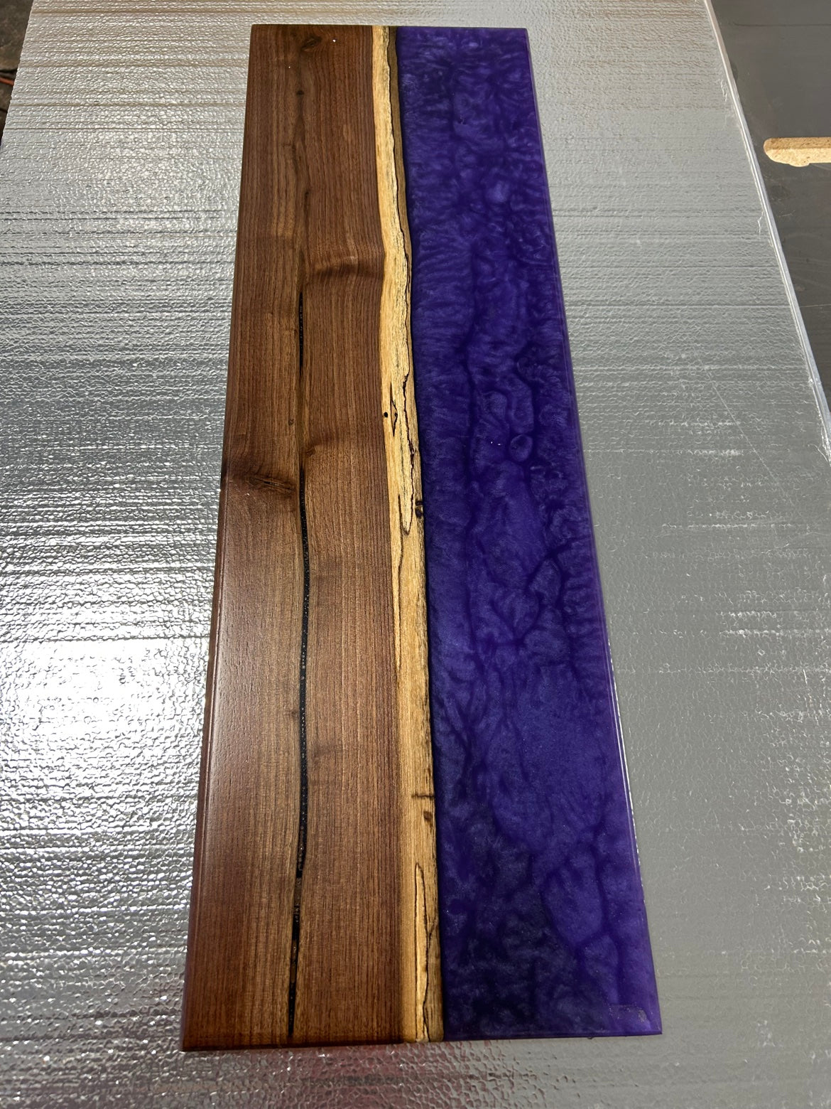 Walnut bath caddy with purple epoxy river, top view